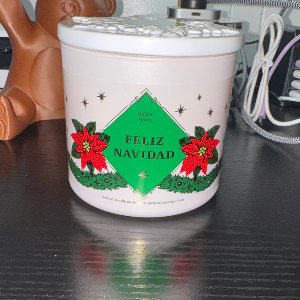 White Barn Feliz Navidad Candle with Red and Green Design